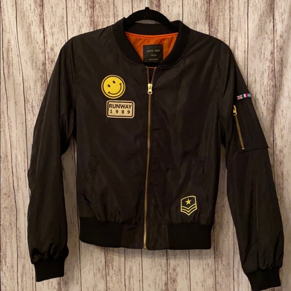 Black bomber with patches